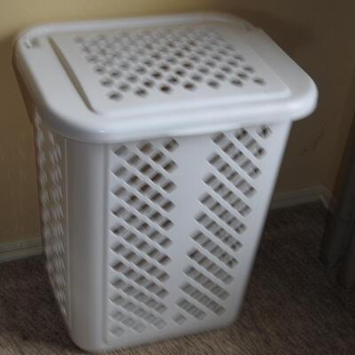 Laundry hamper full of towels