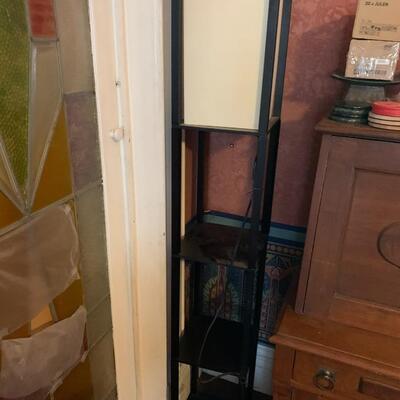 Floor lamp, candles and antique metal fan