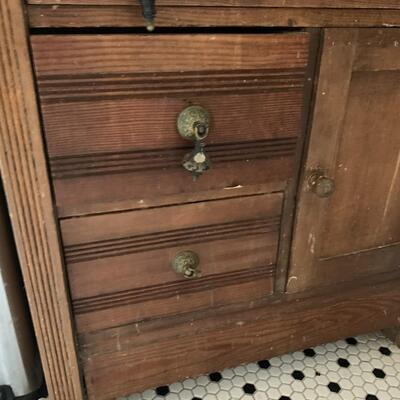 Antique cabinet with marble counter