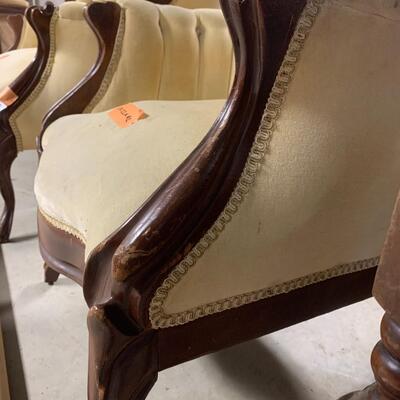 Antique sofa and matching arm chair.