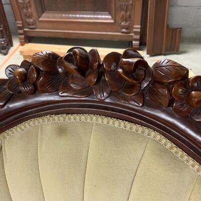 Antique sofa and matching arm chair.