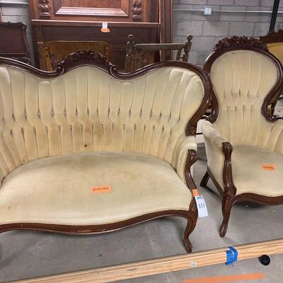 Antique sofa and matching arm chair.