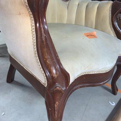 Antique sofa and matching arm chair.