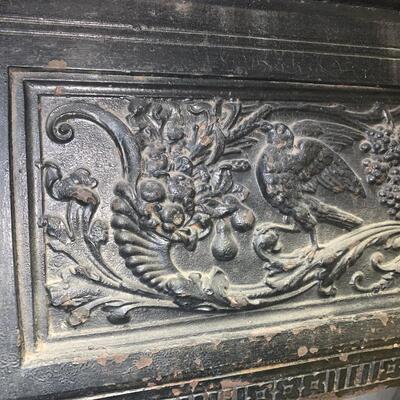 Cast iron and tile fireplace