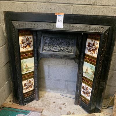 Cast iron and tile fireplace