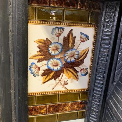 Cast iron and tile fireplace