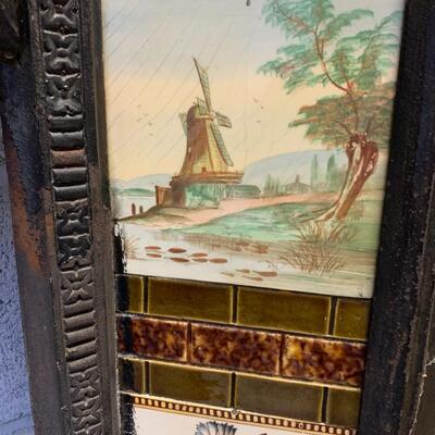 Cast iron and tile fireplace