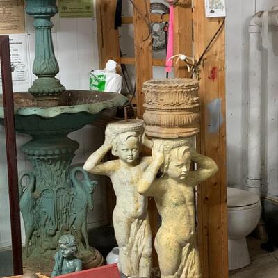 Two cement planter Stands