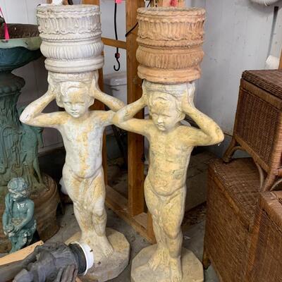 Two cement planter Stands