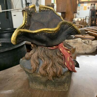 Wooden carving of a Pirate