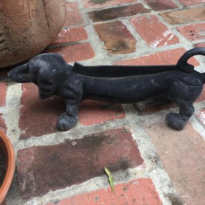 Patio table, iron dachshund and planters