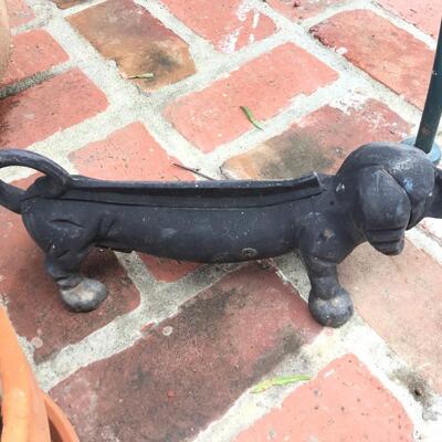 Patio table, iron dachshund and planters