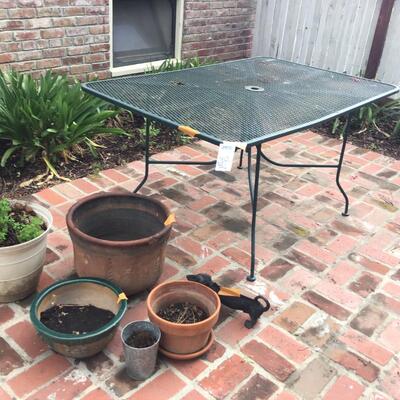 Patio table, iron dachshund and planters