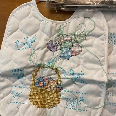 Lot of 2 stamped cross stitch kit baby bibs started