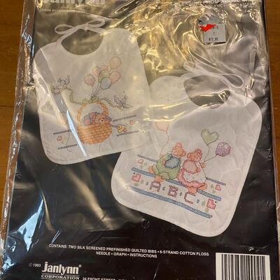 Lot of 2 stamped cross stitch kit baby bibs started