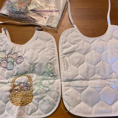 Lot of 2 stamped cross stitch kit baby bibs started