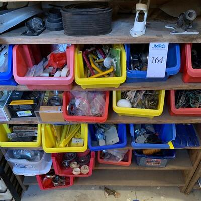 Assorted construction and household supplies, bins and shelves