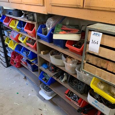 Assorted construction and household supplies, bins and shelves