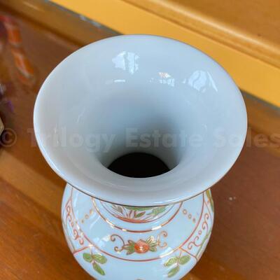Blue Asian vase with orange flowers