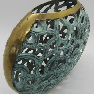 Brass filigree vessel with patina