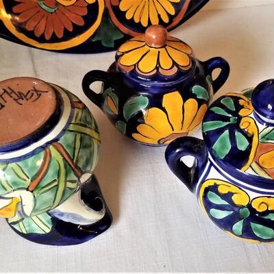 Lot #135  Lot of Mexican pottery - signed