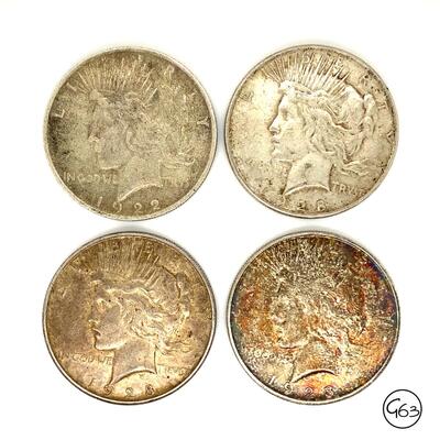 Grouping of 4 Peace Dollars