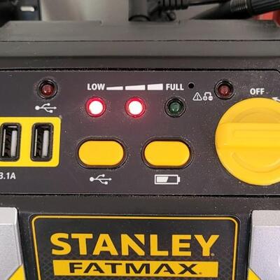 Lot 144: STANLEY 700 Peak Amp Portable Battery Jumpstart Power Bank w/ Charger