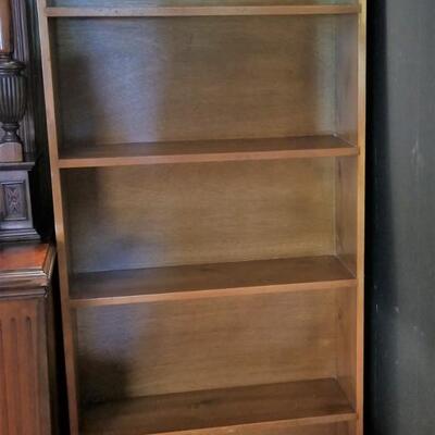 Lot #194  Solid Wood Bookcase - 6 feet tall