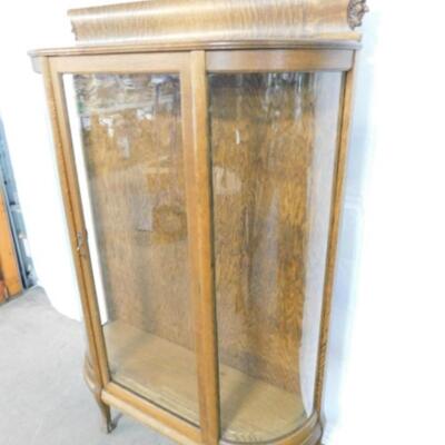 Antique Oak Bow Front Curio Cabinet with Figural Carved Face Accent