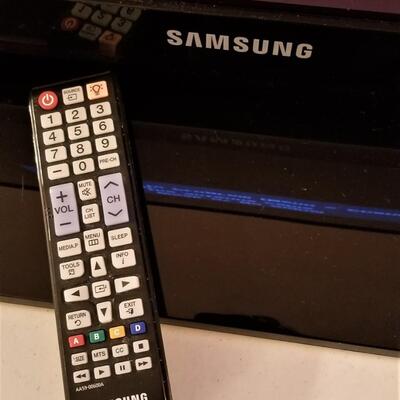 Lot #242  SAMSUNG 43" Flat Screen tv with stand and remote