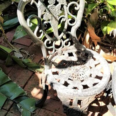 Lot #245  INNOVA Cast Iron Patio Table w/2 chairs