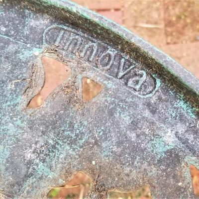 Lot #245  INNOVA Cast Iron Patio Table w/2 chairs