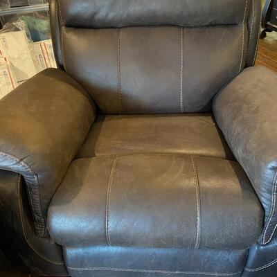 brown leather recliner/ rocker