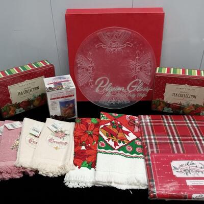 LOT 21W  NEW CHRISTMAS LINENS, TEA COLLECTIONS, GLASS PLATTER AND FLAMELESS MUSICAL CANDLE