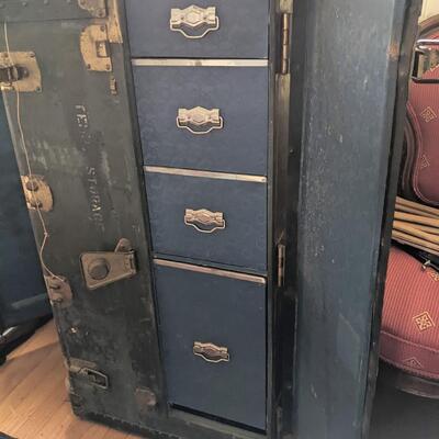 Purchased on site. Army wardrobe trunk Wooden hangers drawers