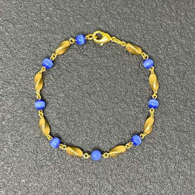 GOLD-TONED BRACELET W/ BLUE BEADS
