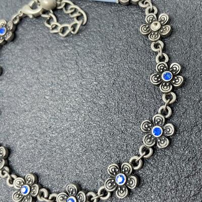 TRENDY FASHION SILVER-TONED FLOWER BRACELET W/ BLUE RHINESTONES