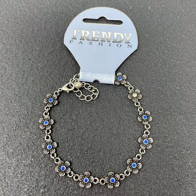 TRENDY FASHION SILVER-TONED FLOWER BRACELET W/ BLUE RHINESTONES