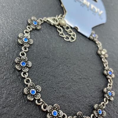 TRENDY FASHION SILVER-TONED FLOWER BRACELET W/ BLUE RHINESTONES
