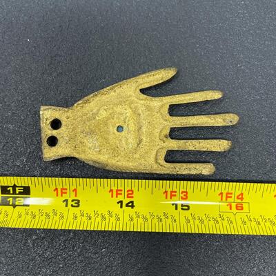 GOLD-TONED METAL HAND EYE FIGURINE