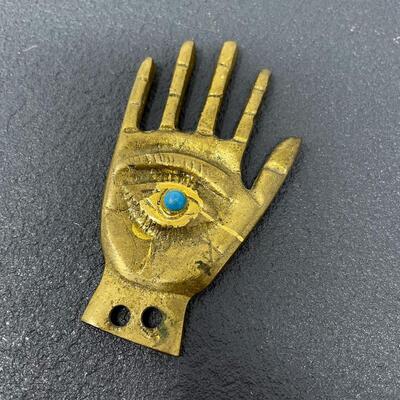 GOLD-TONED METAL HAND EYE FIGURINE