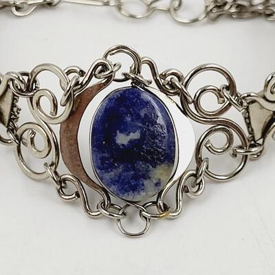 BEAUTIFUL SILVER TONED ORNATE BRACLET
