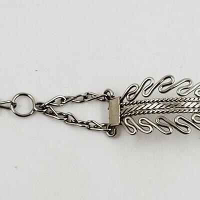 BEAUTIFUL SILVER TONED ORNATE BRACLET