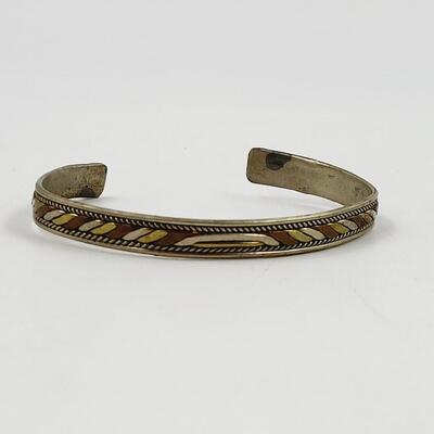 BEAUTIFUL MULTI TONED DECORATIVE METAL BRACELET