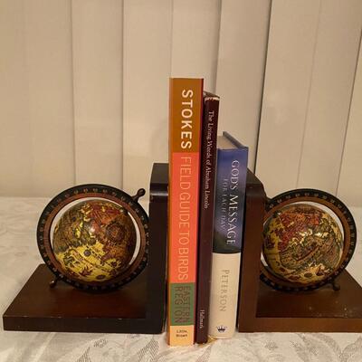 Pair of vintage world globe bookmarks on wooden stands
