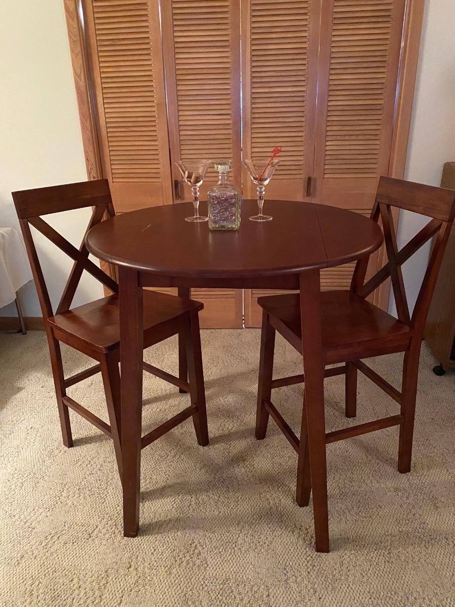 Bistro style table & chairs. Mahogany stain dropleaf table, bar height