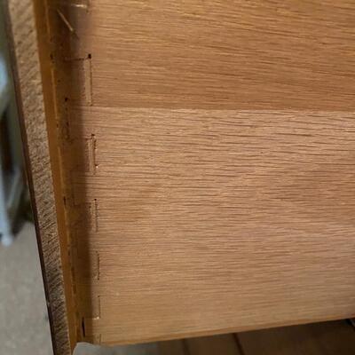 MCM wooden chest of drawers with a laminated top