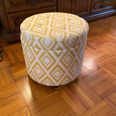 Upholstered ottoman with storage