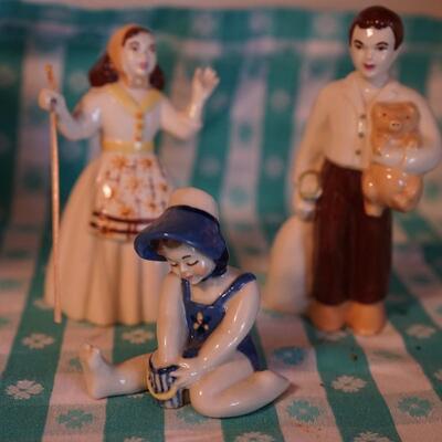 CERAMIC ARTS STUDIO FIGURINES. Pioneer farmer and wife  and more.