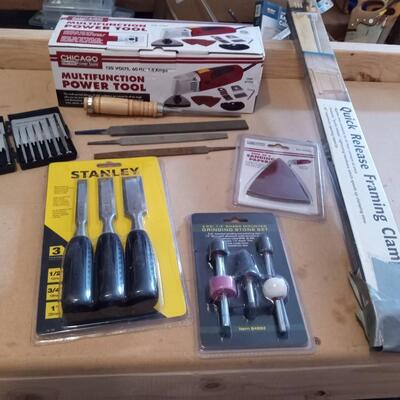 LOT 45  MULTIFUNCTION POWER TOOL, CHISELS, FRAMING CLAMP AND MORE